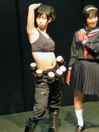 Illustration for article titled 2009's Cosplaying Arcade Game Booth Companions